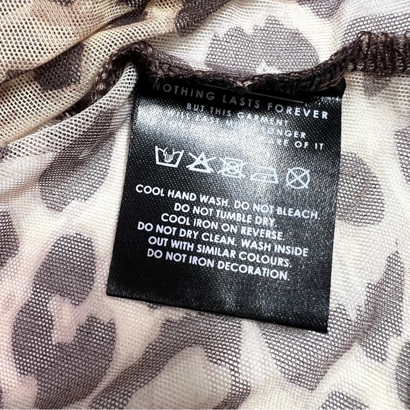 Lazy Oaf G.E.M Sheer Leopard Top with Pink
Faux Fur Trim Size XS - Picture 5 of 7